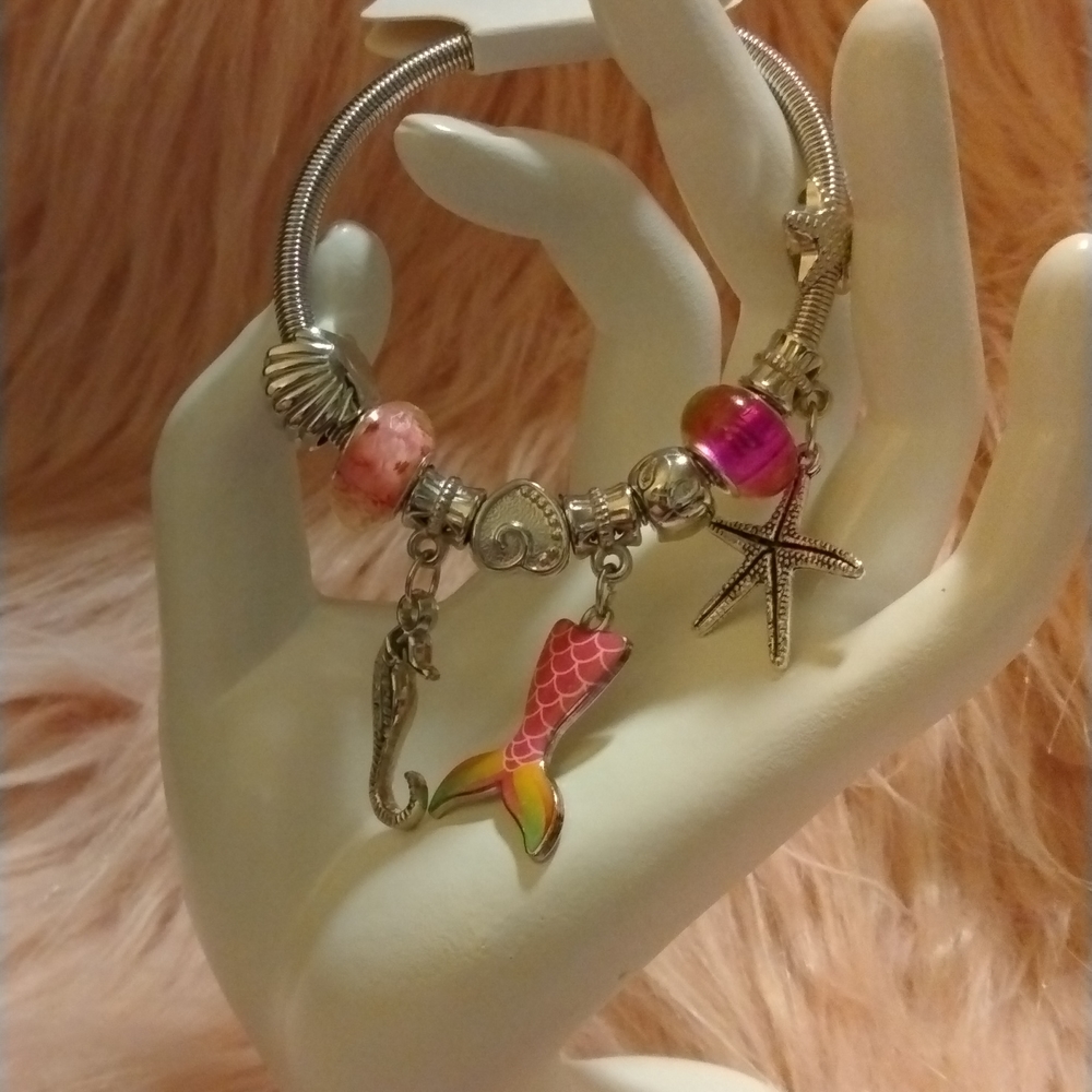 NEW!! By the sea fashion charms bracelet in Silvertone!